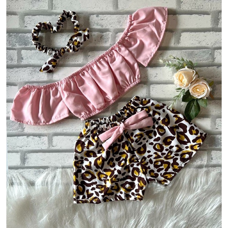 Roupa de best sale oncinha para bebe