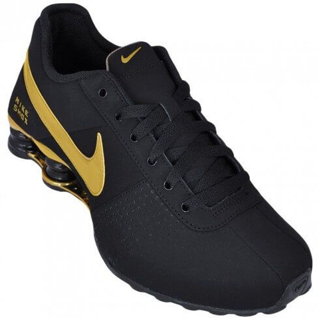 Nike 4 molas hot sale preto e dourado