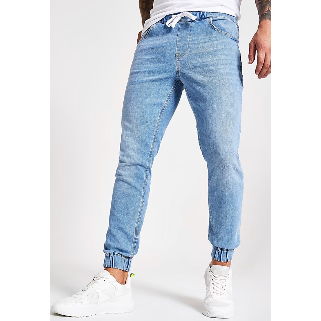 Calça jeans hot sale masculina com punho