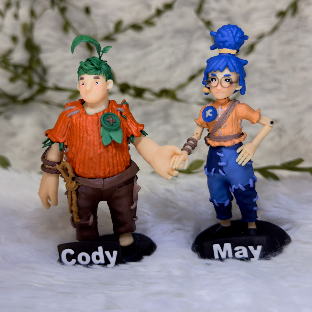 It takes two Miniaturas colecionáveis May Cody