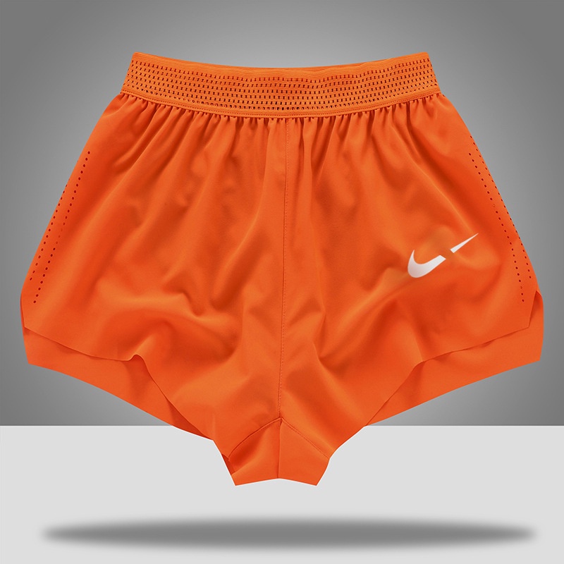 Orange nike best sale shorts womens